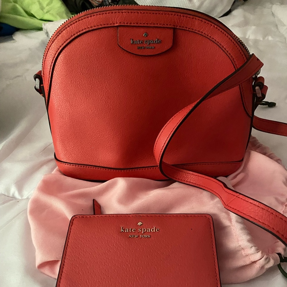 9” x7”x 3” like new bag and wallet. Very little if any wear.